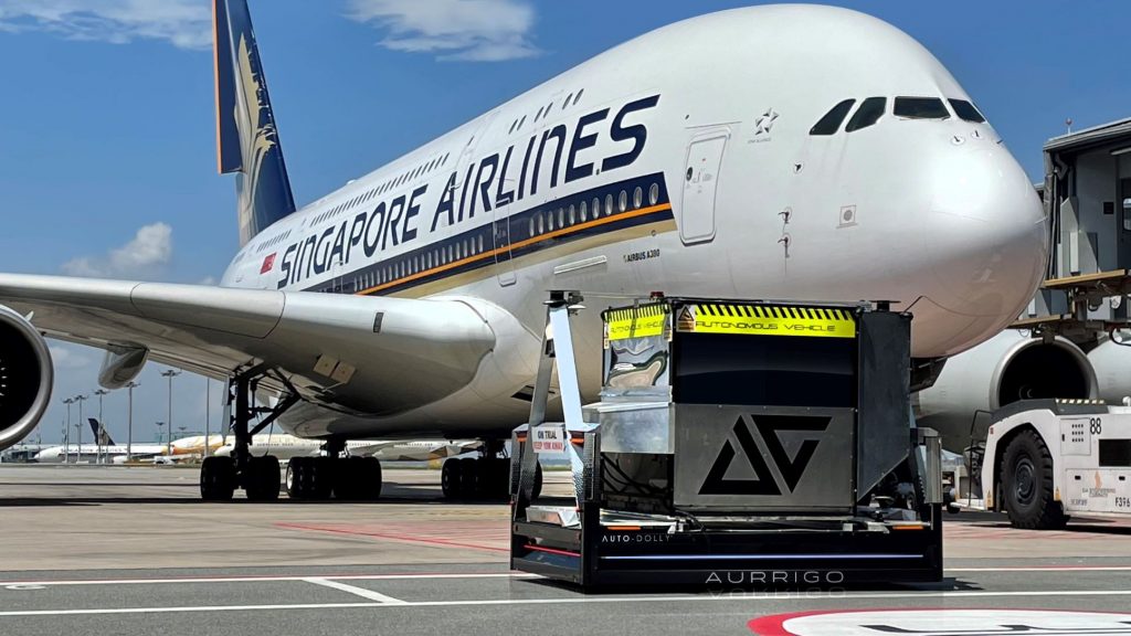 Aurrigo AutoDolly autonomous electric luggage dolly at Changi airport in Singapore.