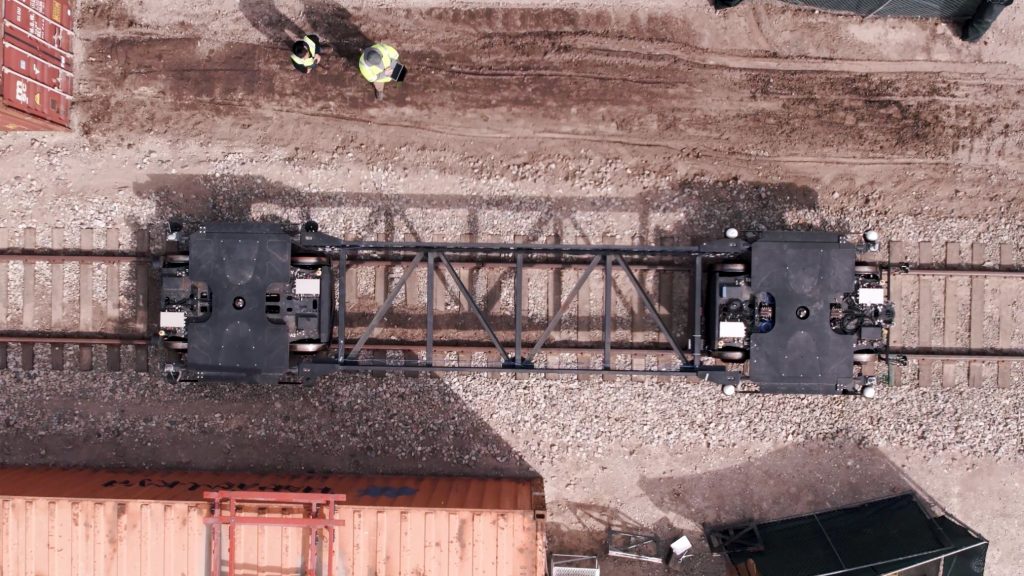 Parallel second-gen vehicle unloaded from above.